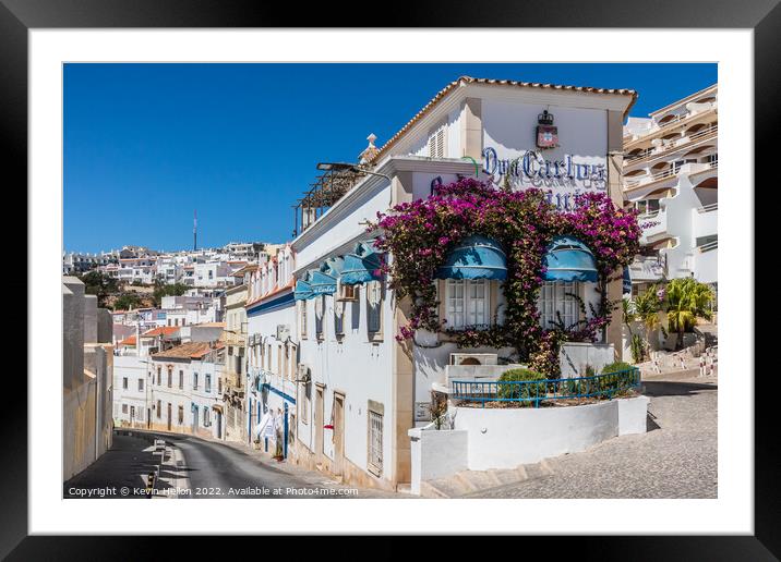 Street in Albuferira old town Framed Mounted Print by Kevin Hellon