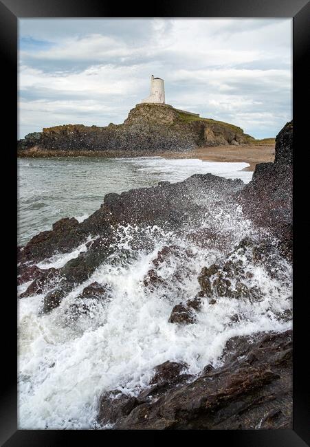 Waves breaking below Twr Mawr lighthouse, Anglesey Framed Print by Andrew Kearton