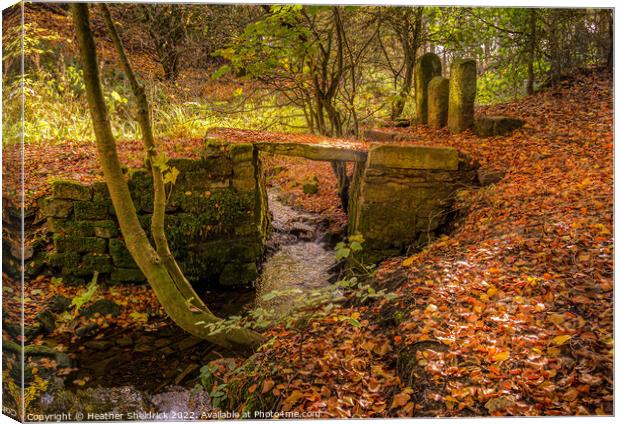 Ancient Bridge in Autumn Canvas Print by Heather Sheldrick