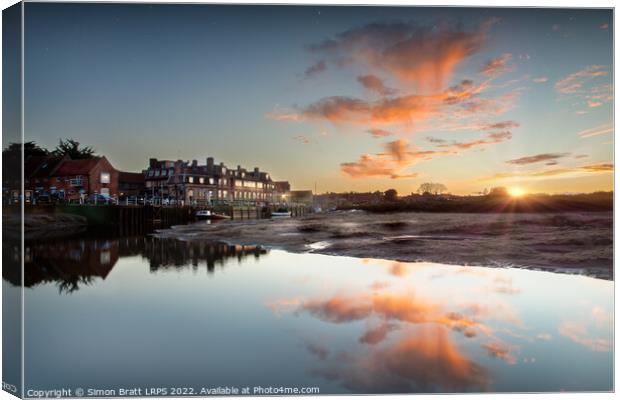Blakeney quay hotel sunset at low tide Canvas Print by Simon Bratt LRPS