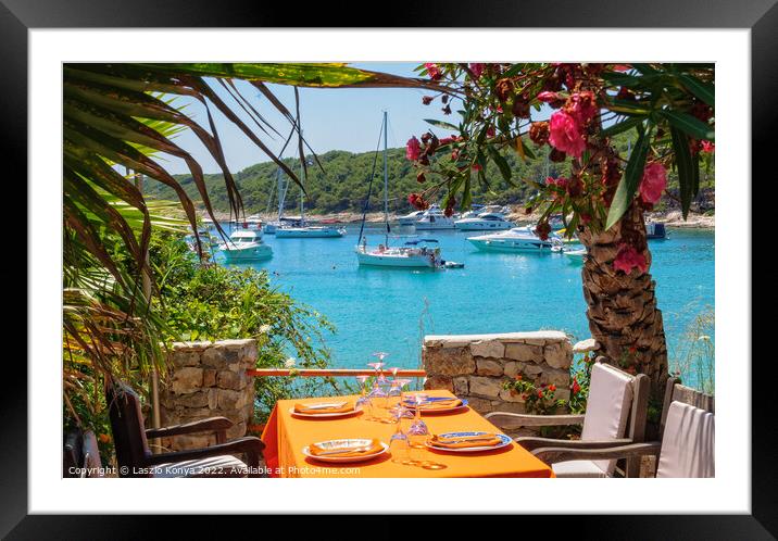 View from the terrace - Milna Bay Framed Mounted Print by Laszlo Konya