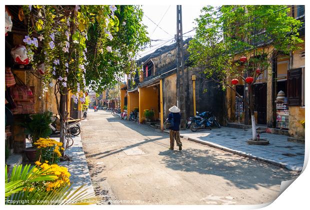 Typical street, Hoi An, Vietnam Print by Kevin Hellon