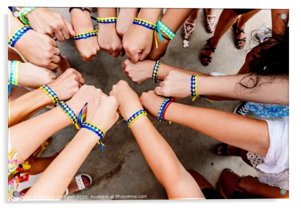 Group of women celebrate the end of the Ukrainian war with brace Acrylic by Joaquin Corbalan