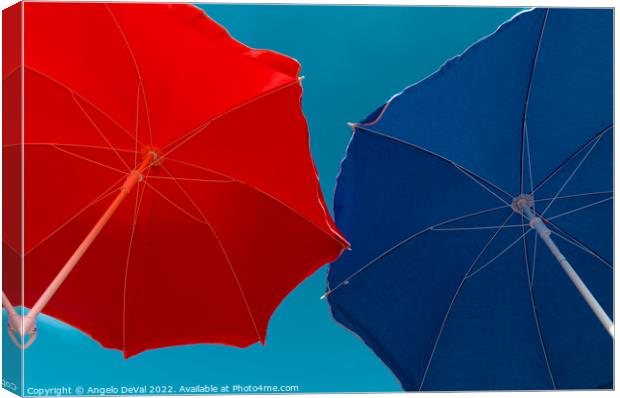Red and Blue Beach Umbrellas Canvas Print by Angelo DeVal