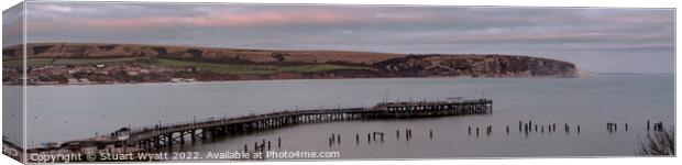 Swanage Piers at Sunset Canvas Print by Stuart Wyatt