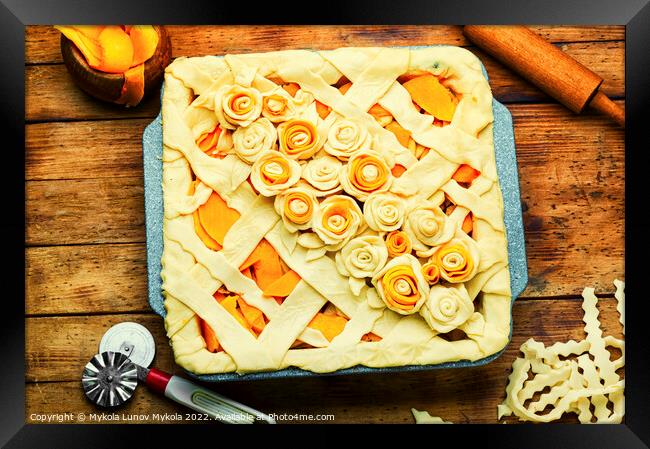 Preparing uncooked pumpkin pie Framed Print by Mykola Lunov Mykola