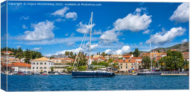 Yachts anchored on Cavtat waterfront in Croatia Canvas Print by Angus McComiskey