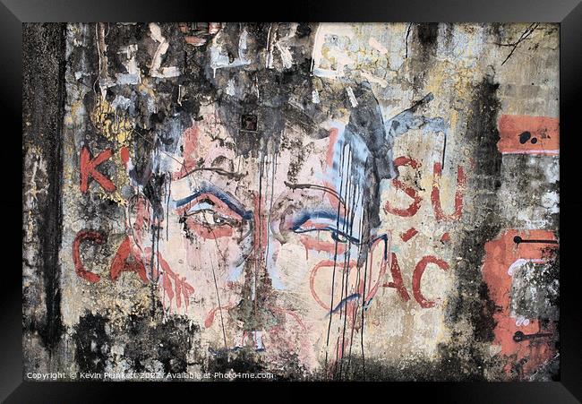Saigon Wall Graffiti Framed Print by Kevin Plunkett