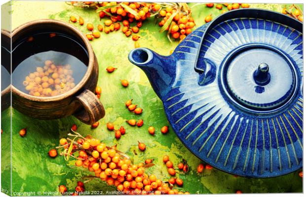 Tea with sea buckthorn, healthy drink Canvas Print by Mykola Lunov Mykola