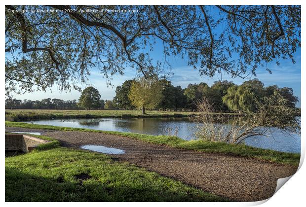 Footpath across the pond Print by Kevin White