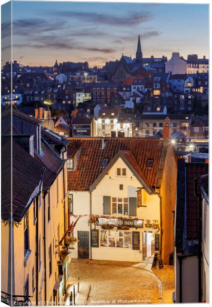 Across the roofs of Whitby Yorkshire twilight Canvas Print by Chris Warren