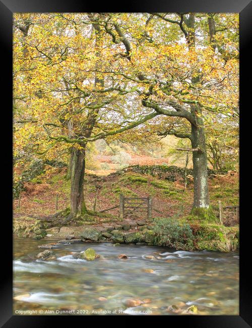 Autumn River Crossing  Framed Print by Alan Dunnett
