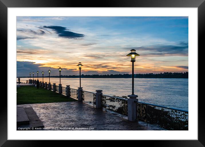 Sunset on the Mekhong river on the promenade in Nong Khai, Thail Framed Mounted Print by Kevin Hellon