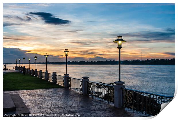 Sunset on the Mekhong river on the promenade in Nong Khai, Thail Print by Kevin Hellon