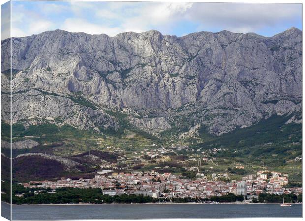 Makarska under Mount Biokovo Canvas Print by Jason Wells