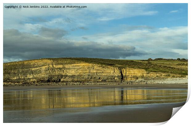 Dunraven Bay cliffs reflected in wet sand Print by Nick Jenkins