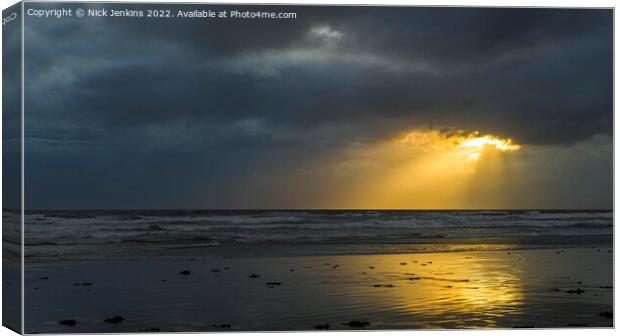 Sunlight Through the Clouds Dunraven Bay  Canvas Print by Nick Jenkins