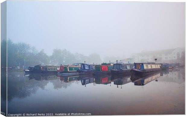 Foggy morning on the Leeds Liverpool canal Canvas Print by Richard Perks