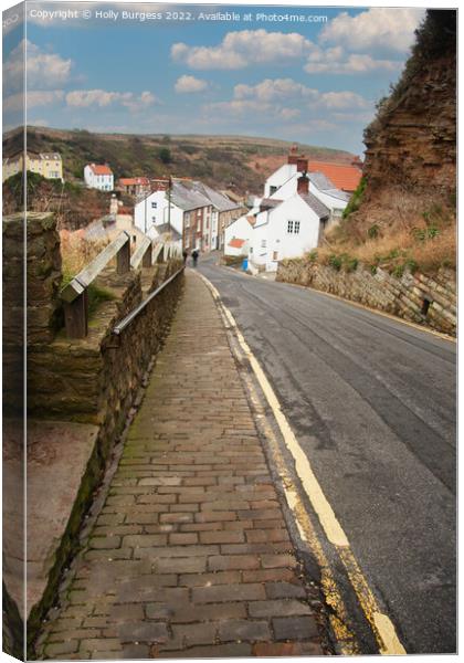 Staithes a beautiful village in Yorkshire, where the sky meets the beach after a long walk  Canvas Print by Holly Burgess