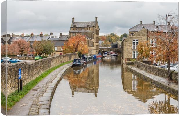 Fallen leaves on the Skipton canal Canvas Print by Jason Wells