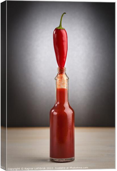 Hot sauce and chili peppers Canvas Print by Ragnar Lothbrok