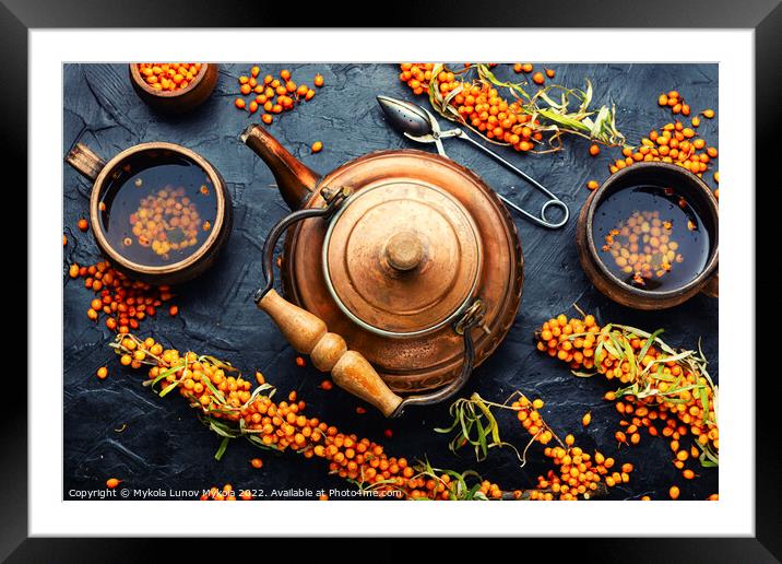 Vitamin tea with sea buckthorn. Framed Mounted Print by Mykola Lunov Mykola
