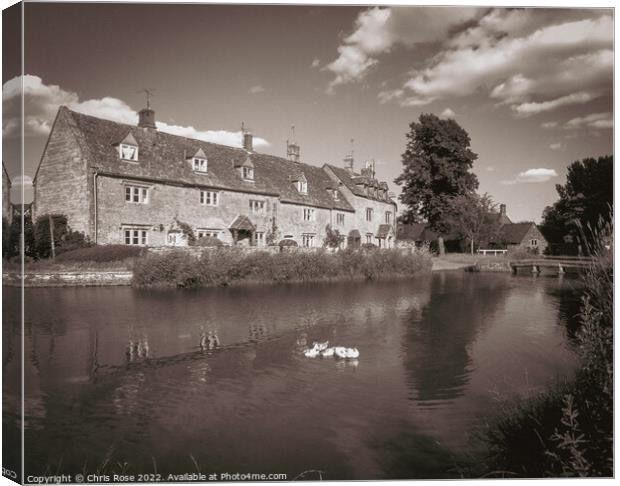 Lower Slaughter riverside cottages Canvas Print by Chris Rose