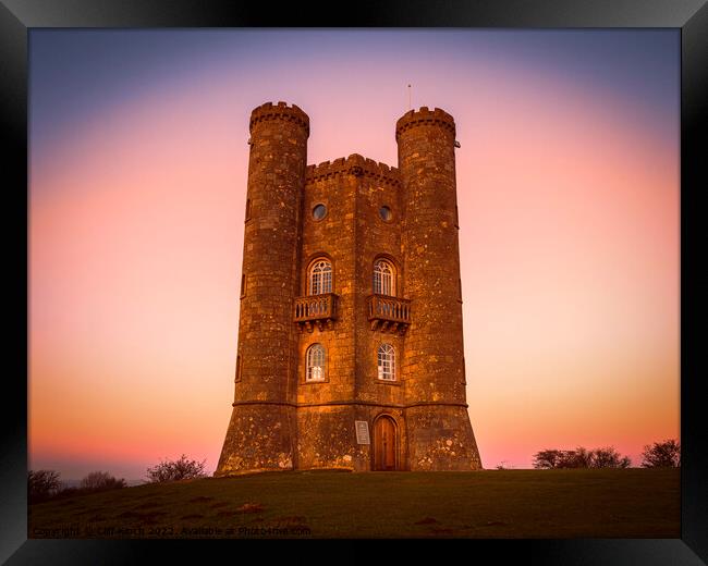 Evening grips Broadway Tower Framed Print by Cliff Kinch