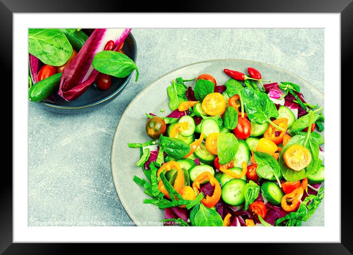 Bright, colorful spring vegetable salad Framed Mounted Print by Mykola Lunov Mykola