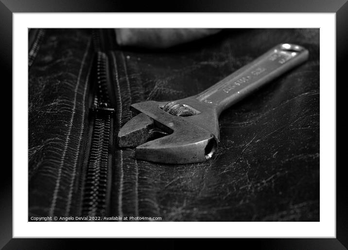 Wrench Tool on a Motorcycle Jacket Framed Mounted Print by Angelo DeVal
