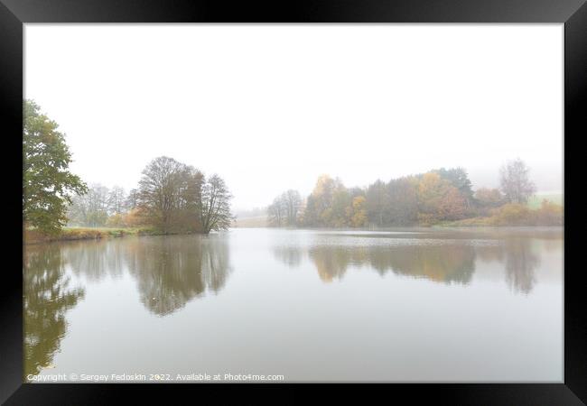 Foggy morning on the lake. Autumn landscape. Framed Print by Sergey Fedoskin