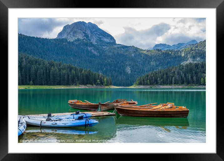 Rowing boats on the Black Lake in Montenegro #2 Framed Mounted Print by Angus McComiskey