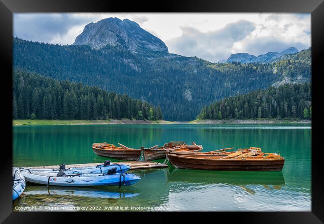 Rowing boats on the Black Lake in Montenegro #2 Framed Print by Angus McComiskey