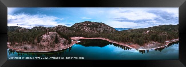 turquoise lake on the edge of a mountain with blue Framed Print by steeve raye