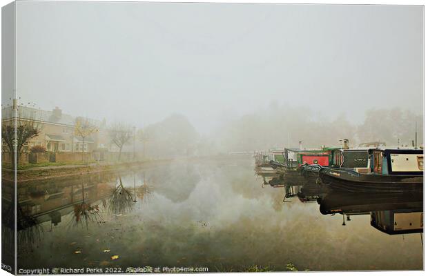 Autumn mist on Leeds Liverpool Canal Canvas Print by Richard Perks