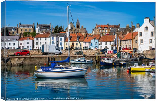 Colourful Boats in St Monans harbour Canvas Print by Angus McComiskey