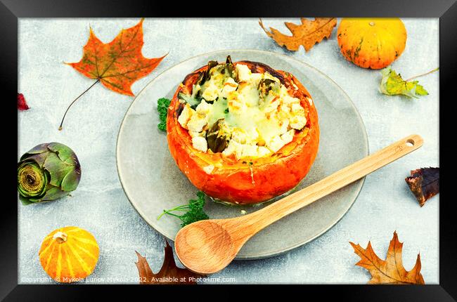 Half pumpkin stuffed with cheese and vegetables. Framed Print by Mykola Lunov Mykola