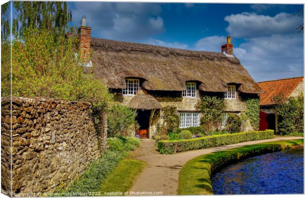 Charming Thatched Cottage in North Yorkshire Canvas Print by Rodney Hutchinson