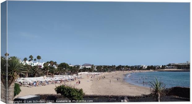 Beach. At. Porto teguise Lanzarote  Canvas Print by Les Schofield