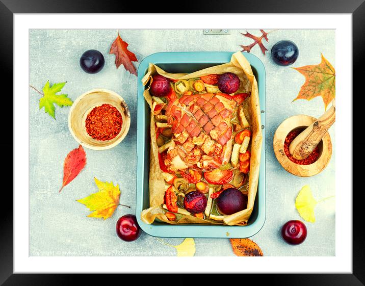 Pork shoulder baked with vegetables and plums. Framed Mounted Print by Mykola Lunov Mykola