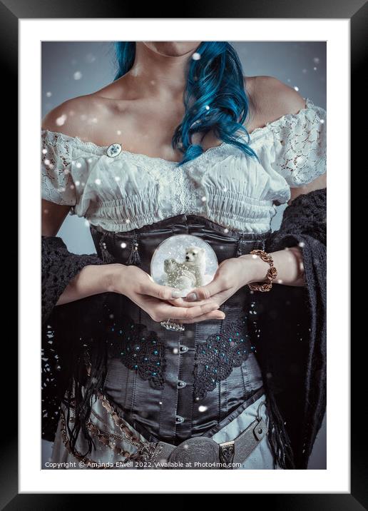 Woman Holding Snowglobe Framed Mounted Print by Amanda Elwell