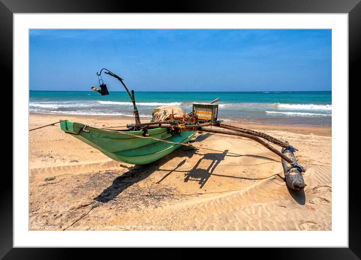Traditional, Sri Lankan fishing boat, beach, Colombo, Sri Lanka Framed Mounted Print by Kevin Hellon