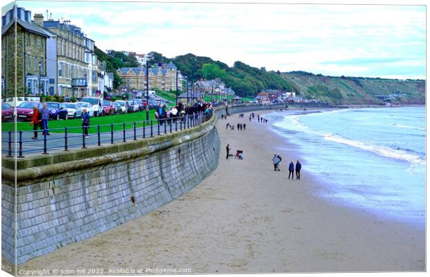 Filey seafront in Setember Canvas Print by john hill