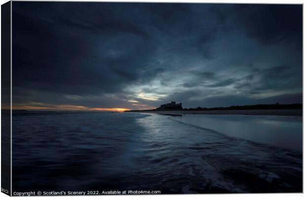 Bamburgh Castle at sunrise Canvas Print by Scotland's Scenery