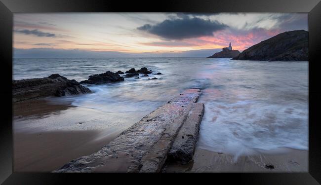 Sunrise over Mumbles lighthouse Framed Print by Leighton Collins