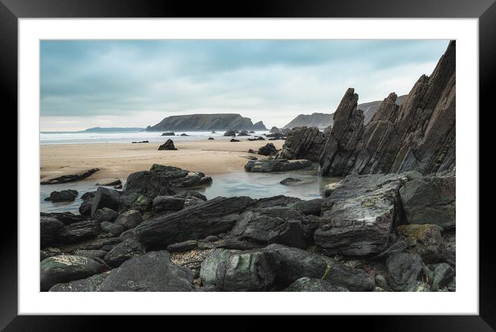 Rocky beach Framed Mounted Print by Colin Duffy