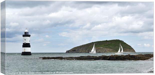 Penmon Lighthouse and Racing Sailboats. Canvas Print by Philip Veale