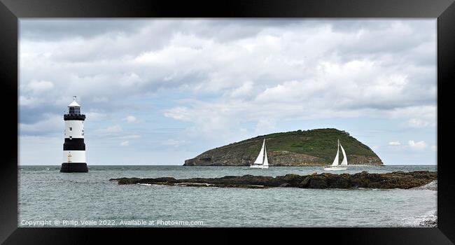 Penmon Lighthouse and Racing Sailboats. Framed Print by Philip Veale