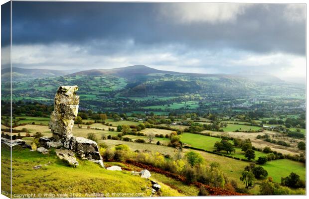 Sugar Loaf and Skirrid under a Stormy Sky. Canvas Print by Philip Veale