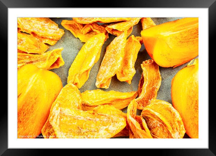 Dried persimmon fruits. Framed Mounted Print by Mykola Lunov Mykola